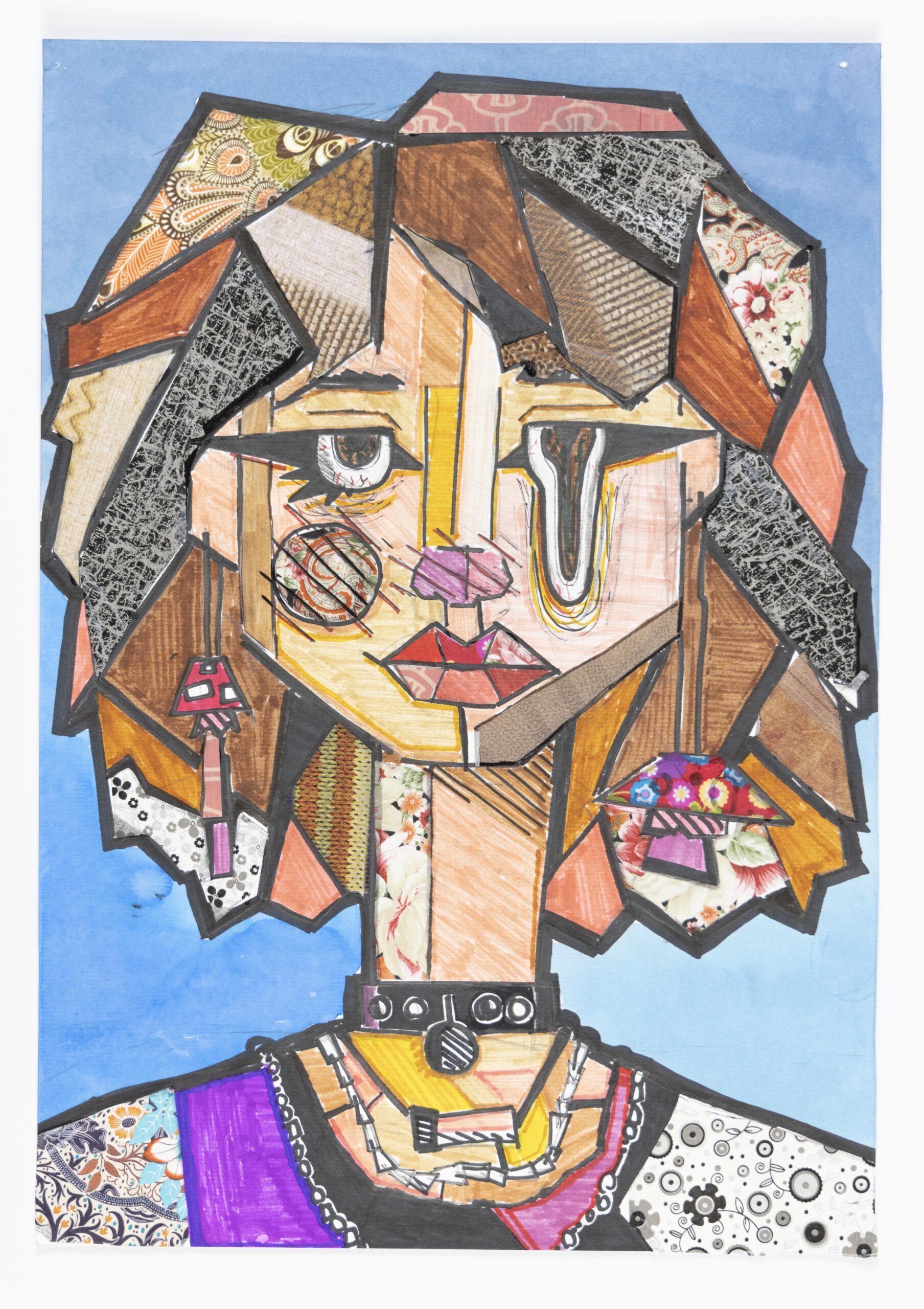 Rysunek przedstawia profil dziewczyny w technice patchwork